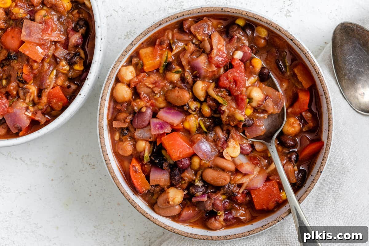 The Ultimate Vegan Bean Chili stovetop Slow Cooker Instant Pot 12 A wider shot of the Vegan Bean Chili in a bowl, showcasing its serving potential and delicious appeal.
