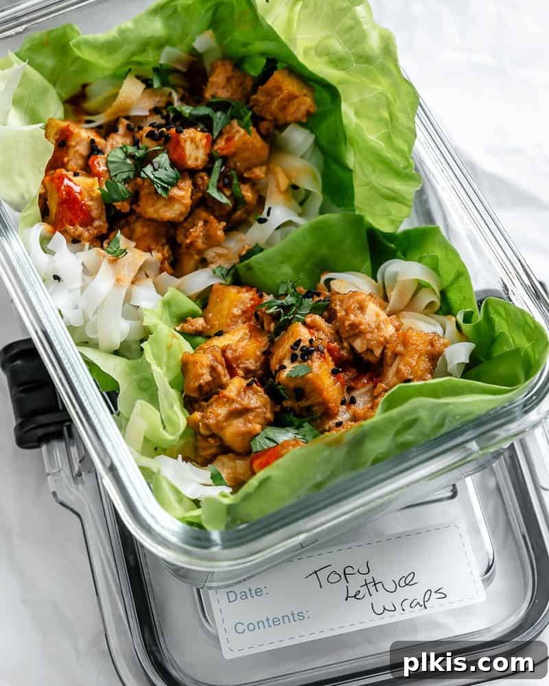 Separated Tofu Lettuce Wrap components (tofu filling and lettuce) stored in airtight containers, ready for meal prep.