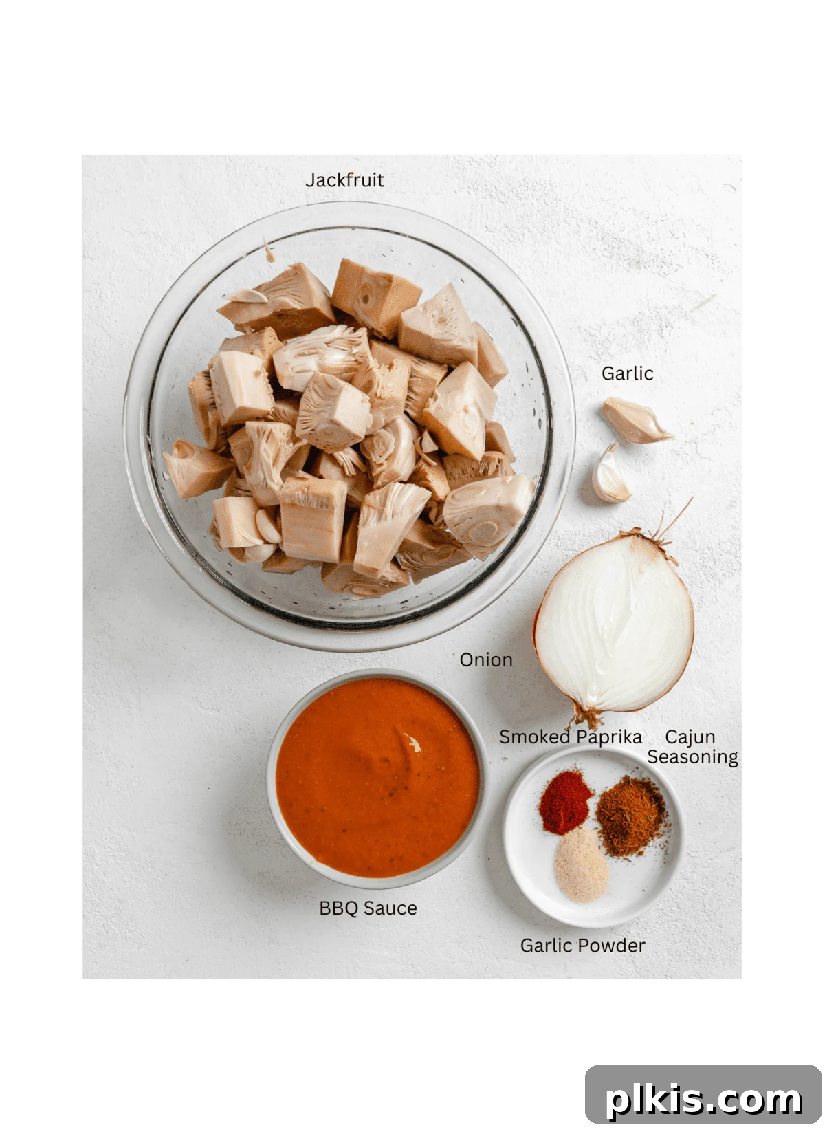 Smoky Vegan Jackfruit BBQ 3 clear bowl of jackfruit alongside measured out ingredients for BBQ jackfruit