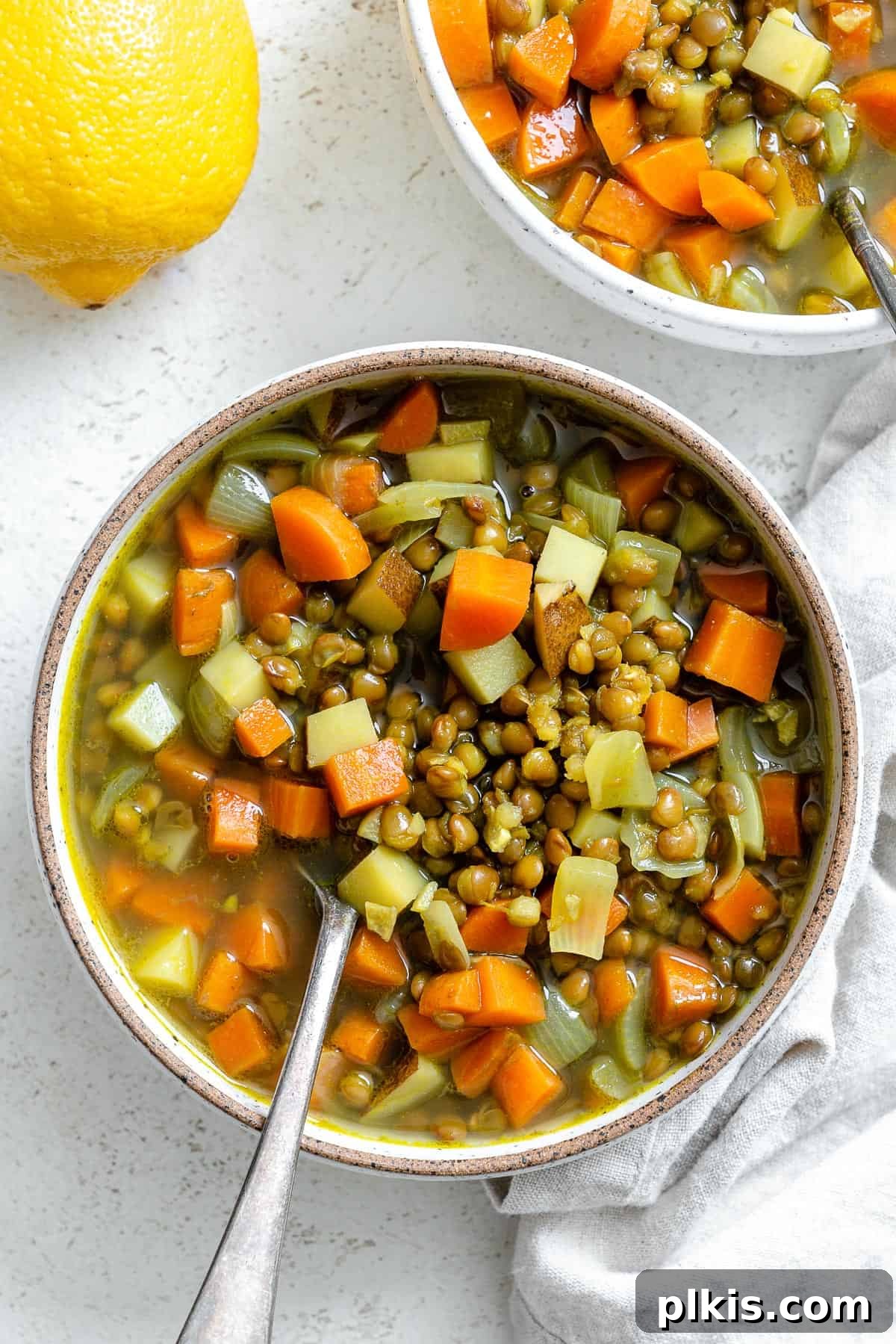 Golden Lentil and Carrot Delight 2 completed Lentil and Carrot Soup in a bowl against a light surface