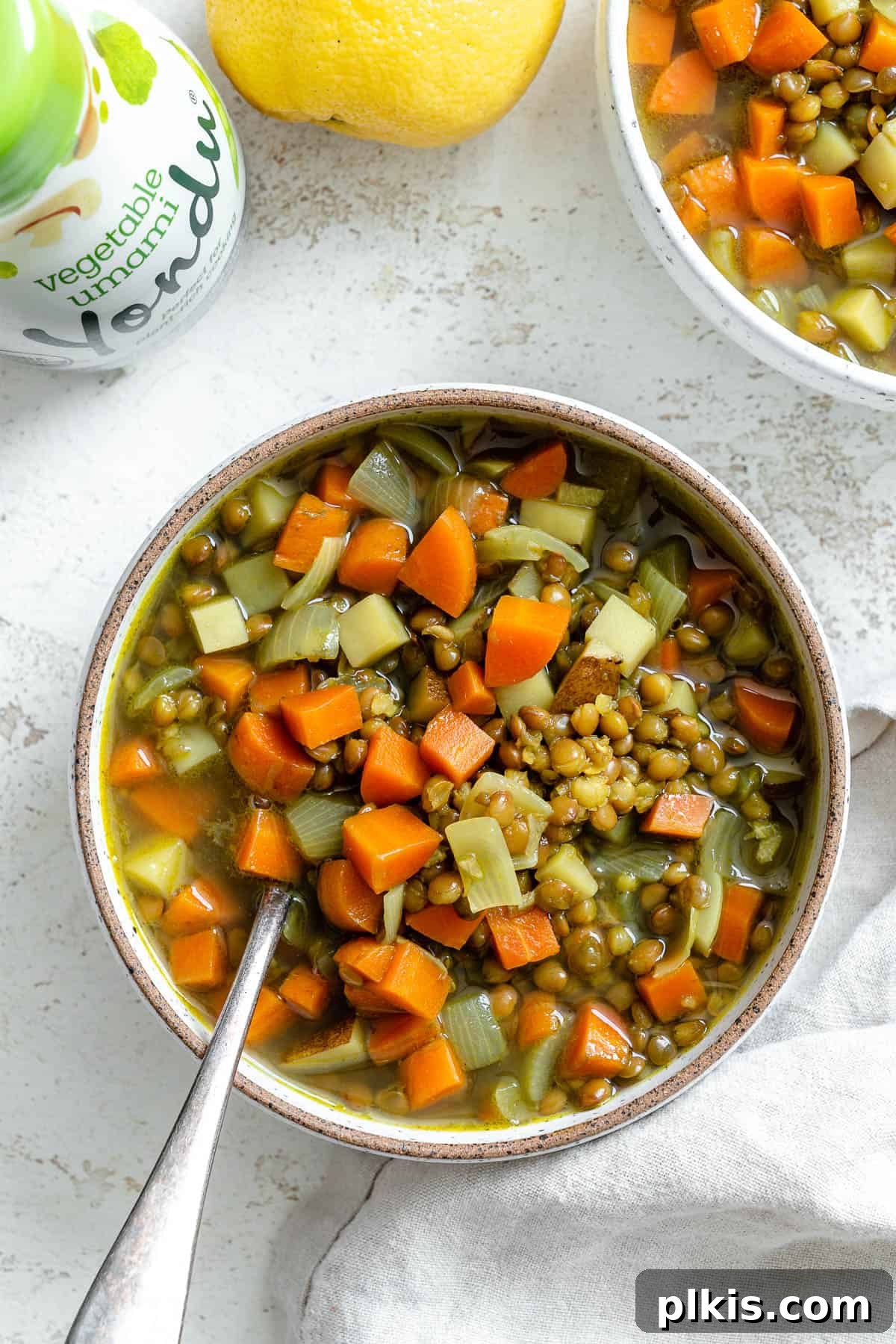 Golden Lentil and Carrot Delight 13 completed Lentil and Carrot Soup in a bowl against a light surface