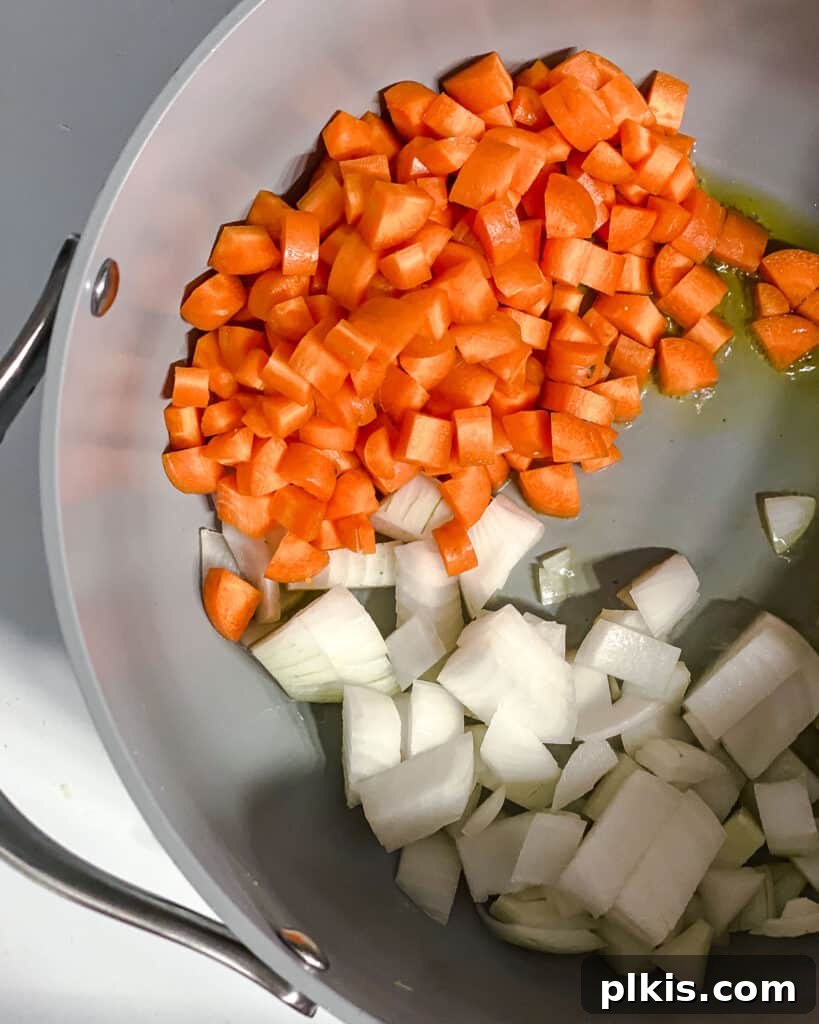 Golden Lentil and Carrot Delight 5 process shot of carrots and onions added to pan