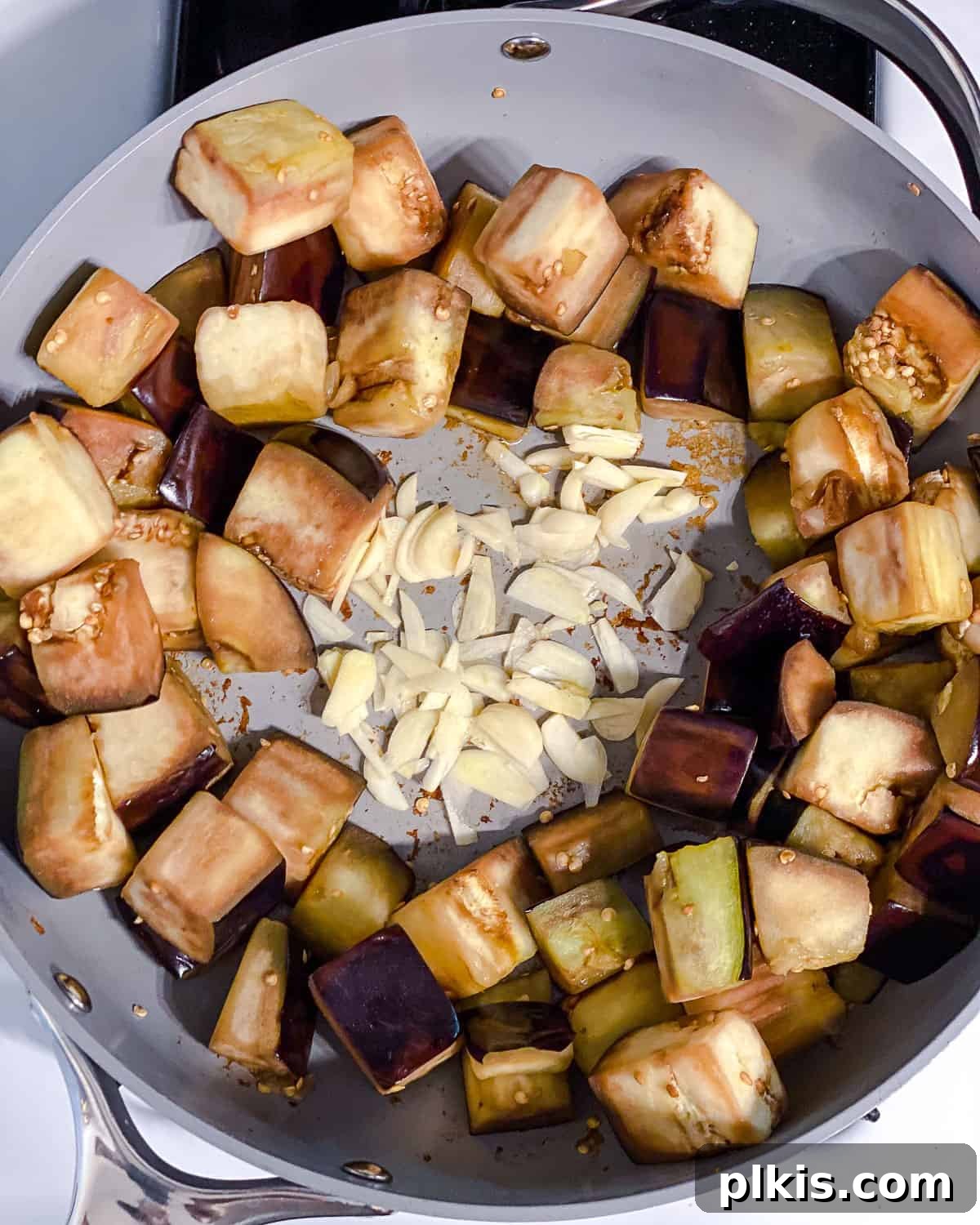 Golden Sautéed Eggplant with Maple Soy Glaze 11 Process shot post adding garlic to pan