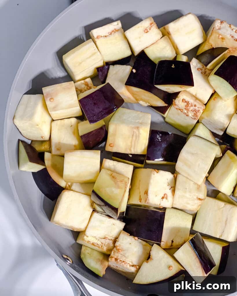 Golden Sautéed Eggplant with Maple Soy Glaze 9 Process shot of cooking eggplant in pan