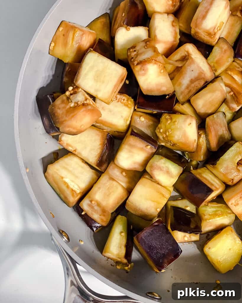 Golden Sautéed Eggplant with Maple Soy Glaze 10 Process shot of cooking eggplant in pan