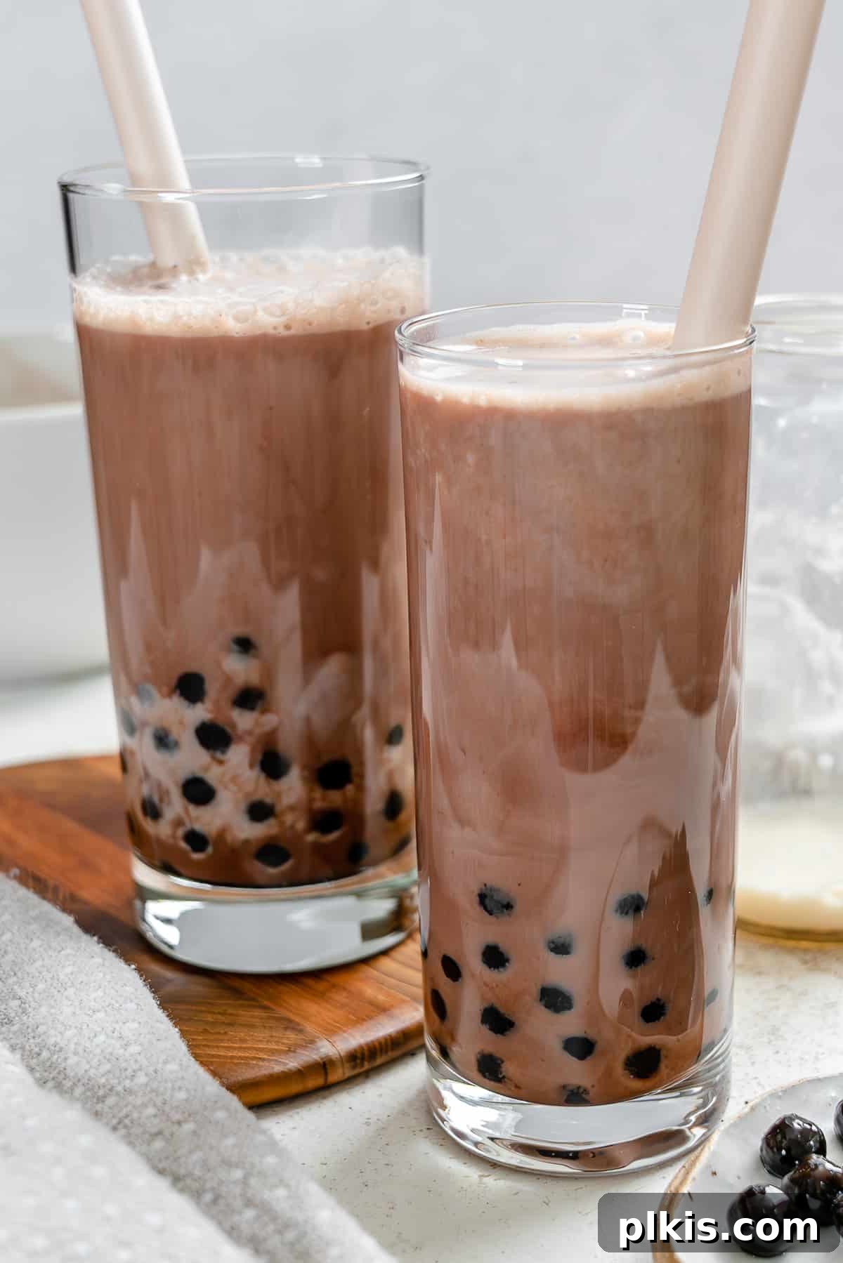 Velvet Chocolate Tea 8 Close-up of two glasses of completed Chocolate Milk Tea with boba, ready to drink.