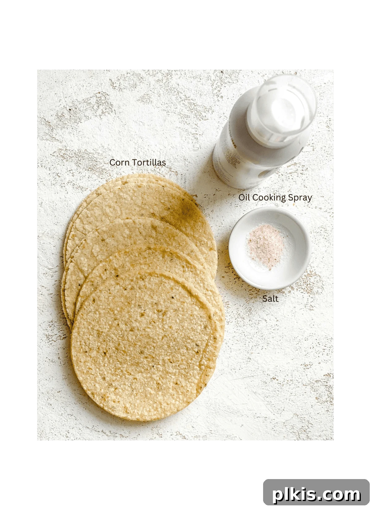 The Crispiest Air Fryer Tortilla Chips 3 ingredients for Air Fryer Tortilla Chips measured out against a white surface