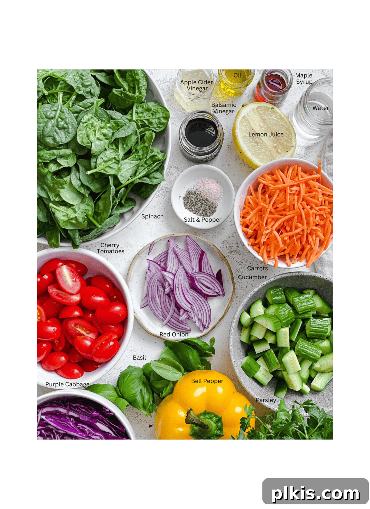 Kaleidoscope Salad 3 ingredients for Rainbow Salad measured out against a white surface