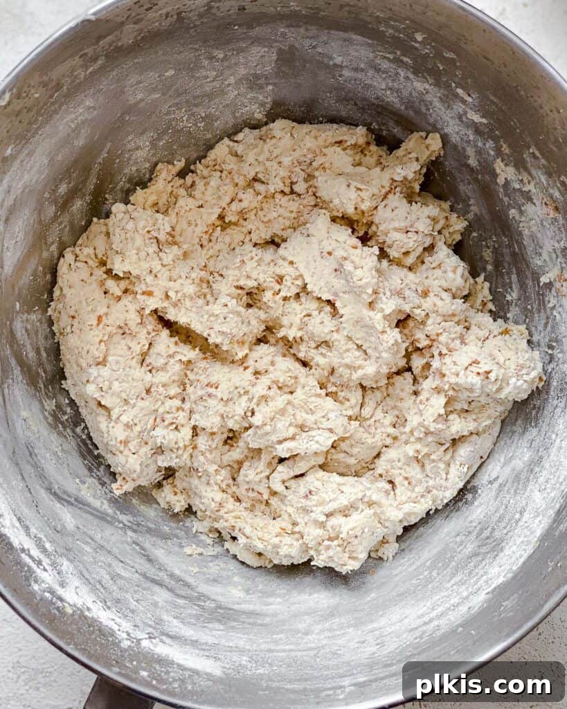 Zesty Vegan Lemon Shortbread 15 Process shot of mixing the dry and wet ingredients together in a bowl until just combined.