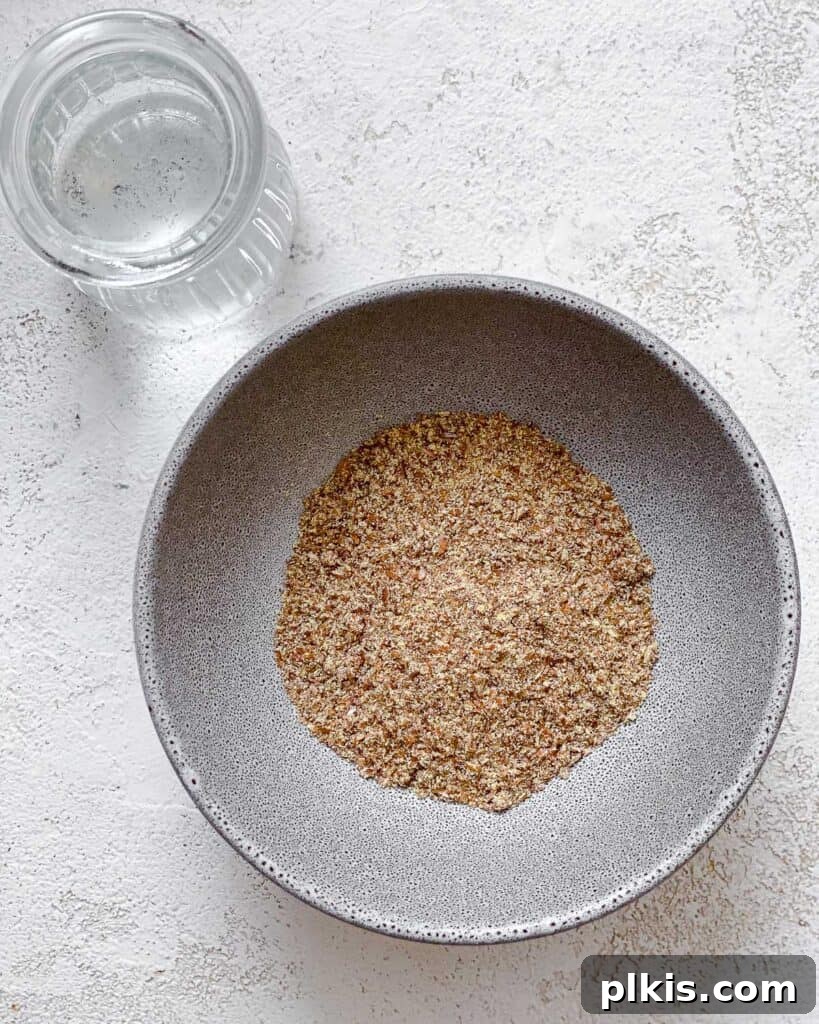 Zesty Vegan Lemon Shortbread 4 Flaxseed and water measured out in separate bowls, ready to be combined.