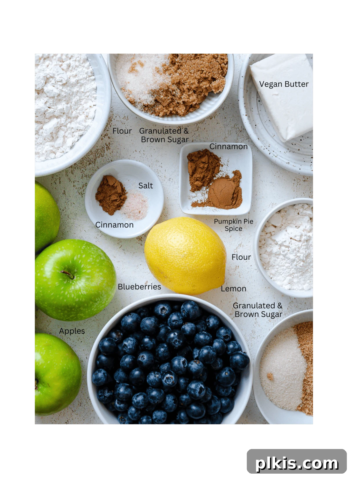 Warm Apple Blueberry Crumble 3 ingredients for Apple and Blueberry Crumble measured out against a white surface