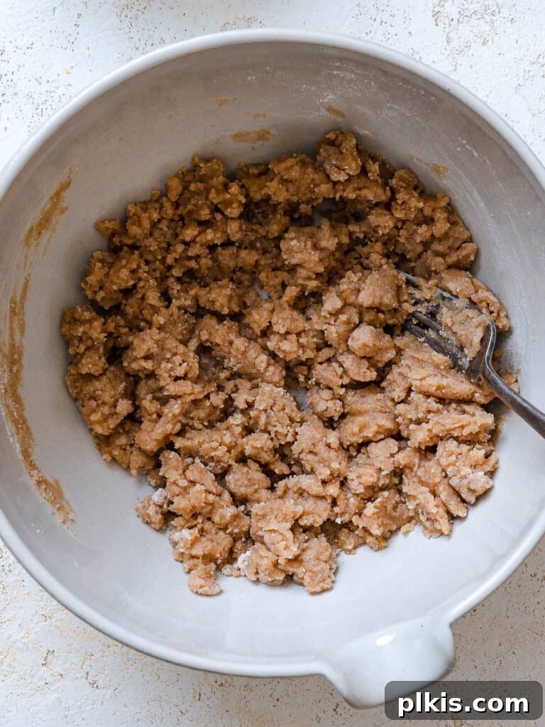 Warm Apple Blueberry Crumble 6 process shot of forming crumble in bowl