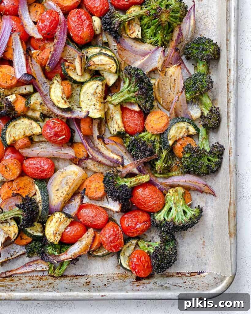Roasted Garden Couscous Medley 11 Beautifully roasted vegetables on a baking sheet, golden and tender.