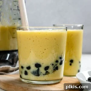 Tropical Mango Bubble 13 completed Mango Bubble Tea with another glass in the background