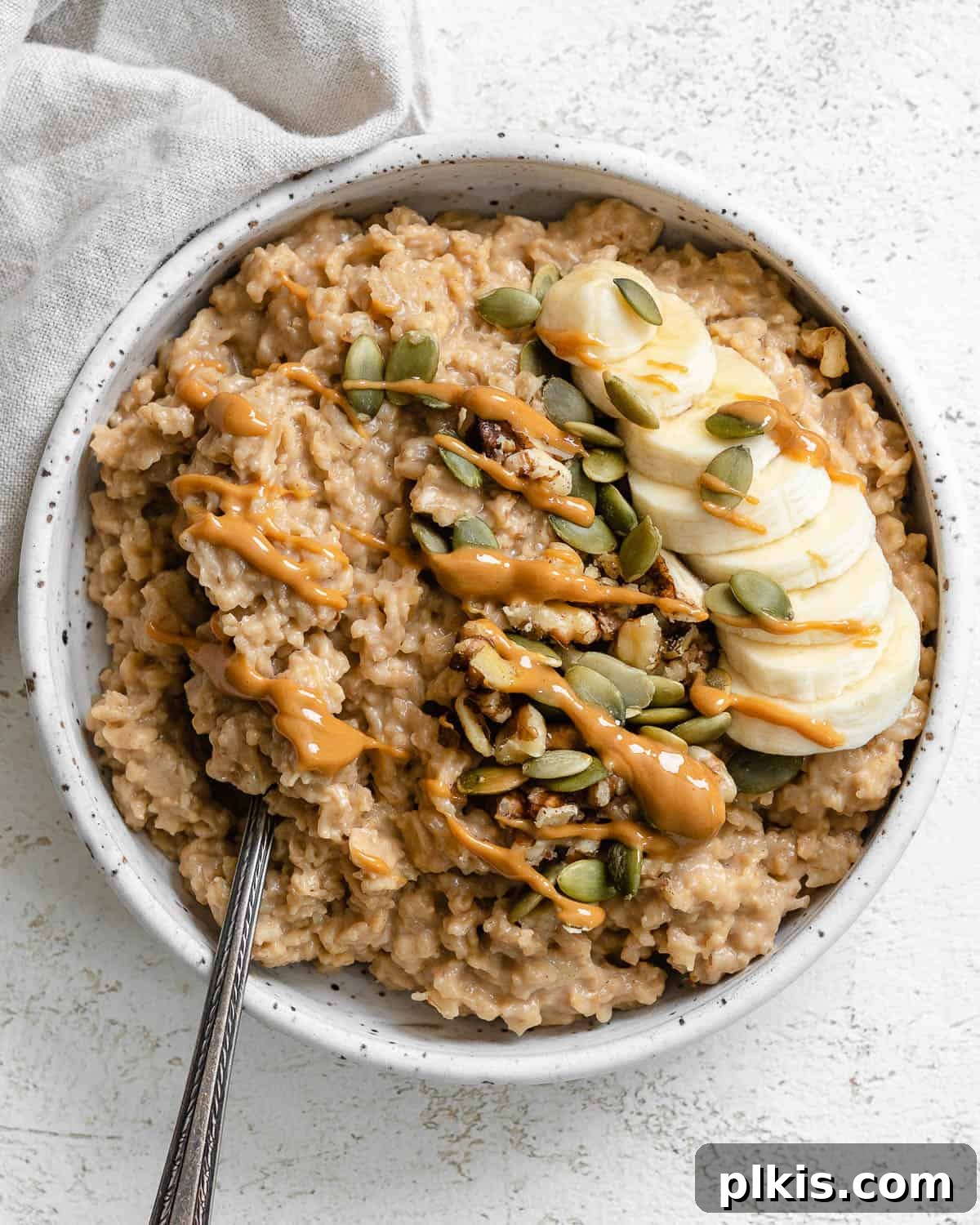 completed Easy Peanut Butter Oatmeal in a bowl against a light background