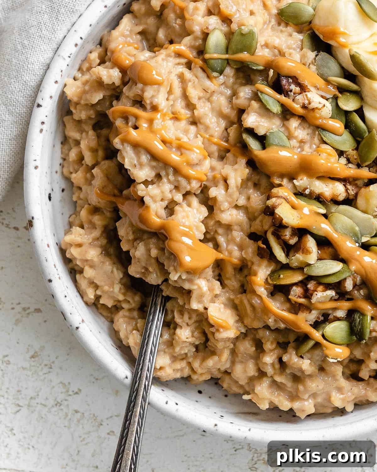 completed Easy Peanut Butter Oatmeal in a bowl against a light background