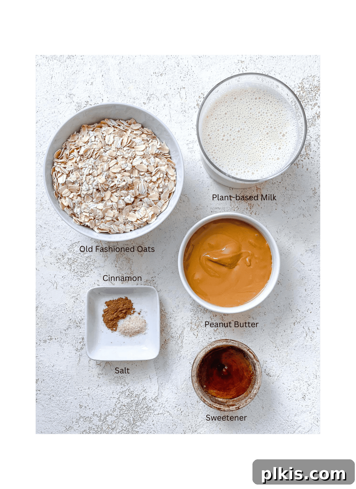 ingredients for Easy Peanut Butter Oatmeal measured out against a white surface