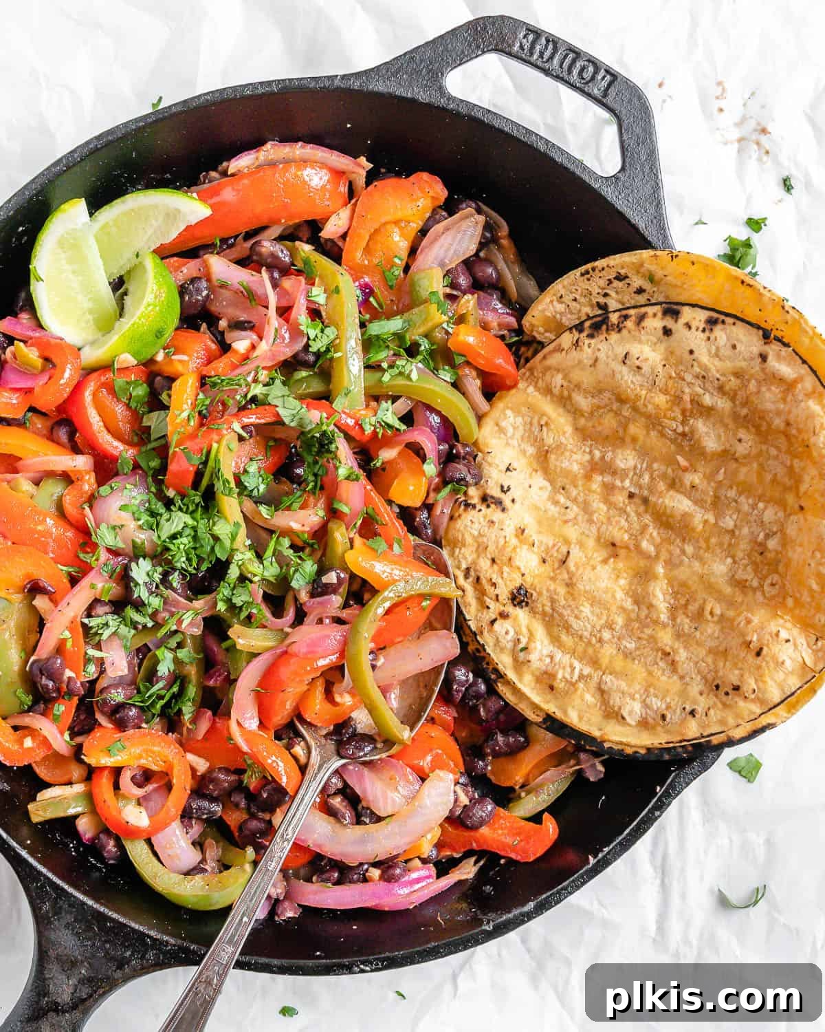 Sizzling Veggie Tacos 8 completed Vegan Fajita Tacos against a white surface