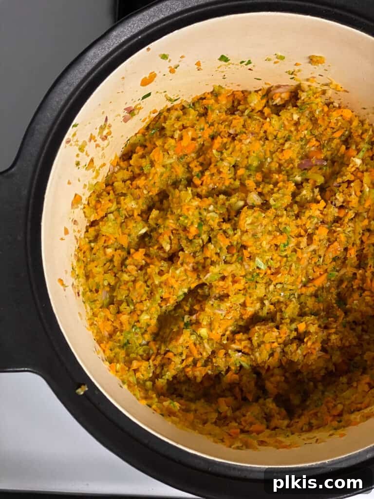Hearty Vegan Ragu 7 Process shot showing the mirepoix vegetables cooking down in the pan, becoming fragrant and tender.