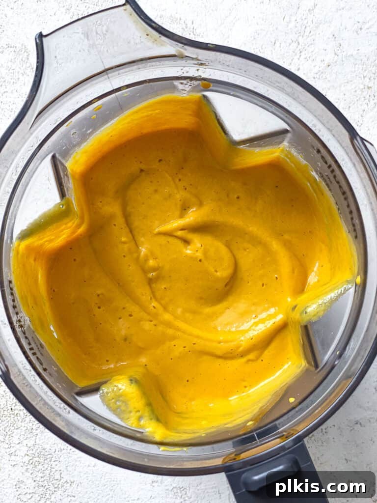 Simple Golden Carrot Sauce 14 process shot showing post blended sauce