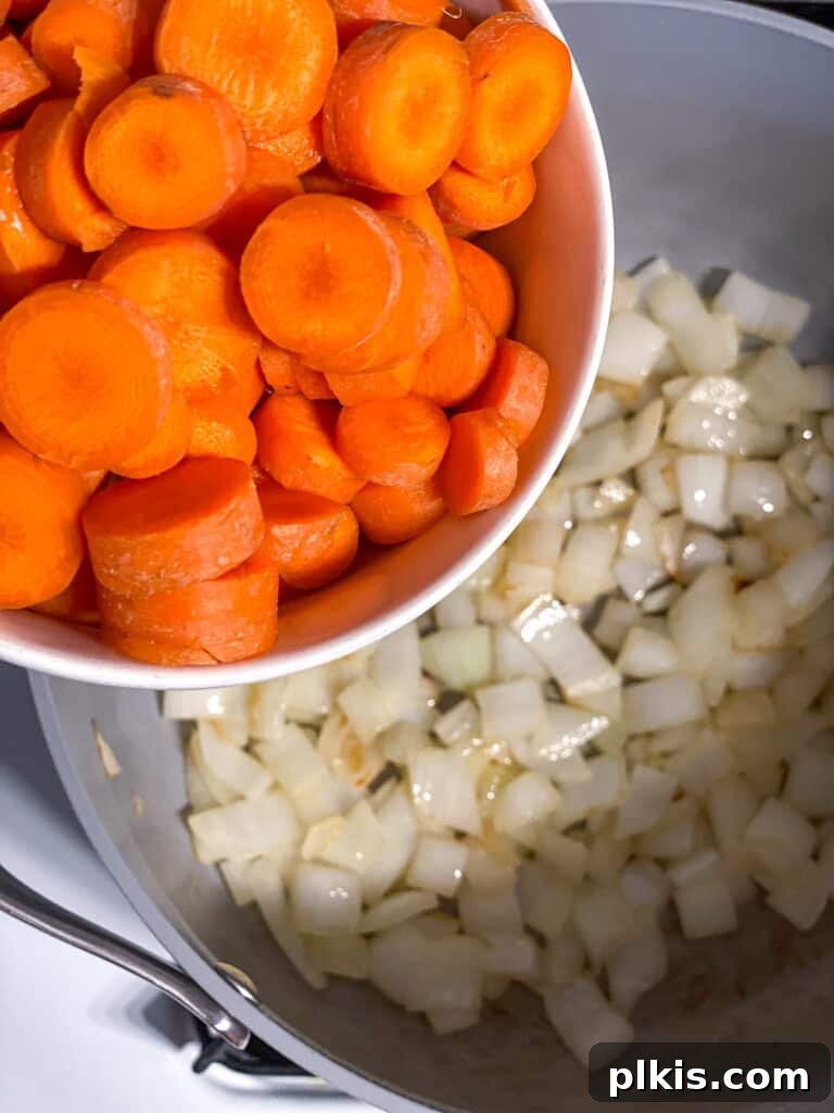 Simple Golden Carrot Sauce 7 process shot of adding carrots to pan