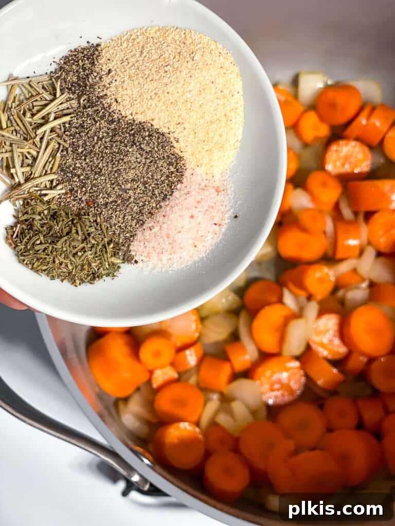Simple Golden Carrot Sauce 10 process shot of adding seasoning to pan
