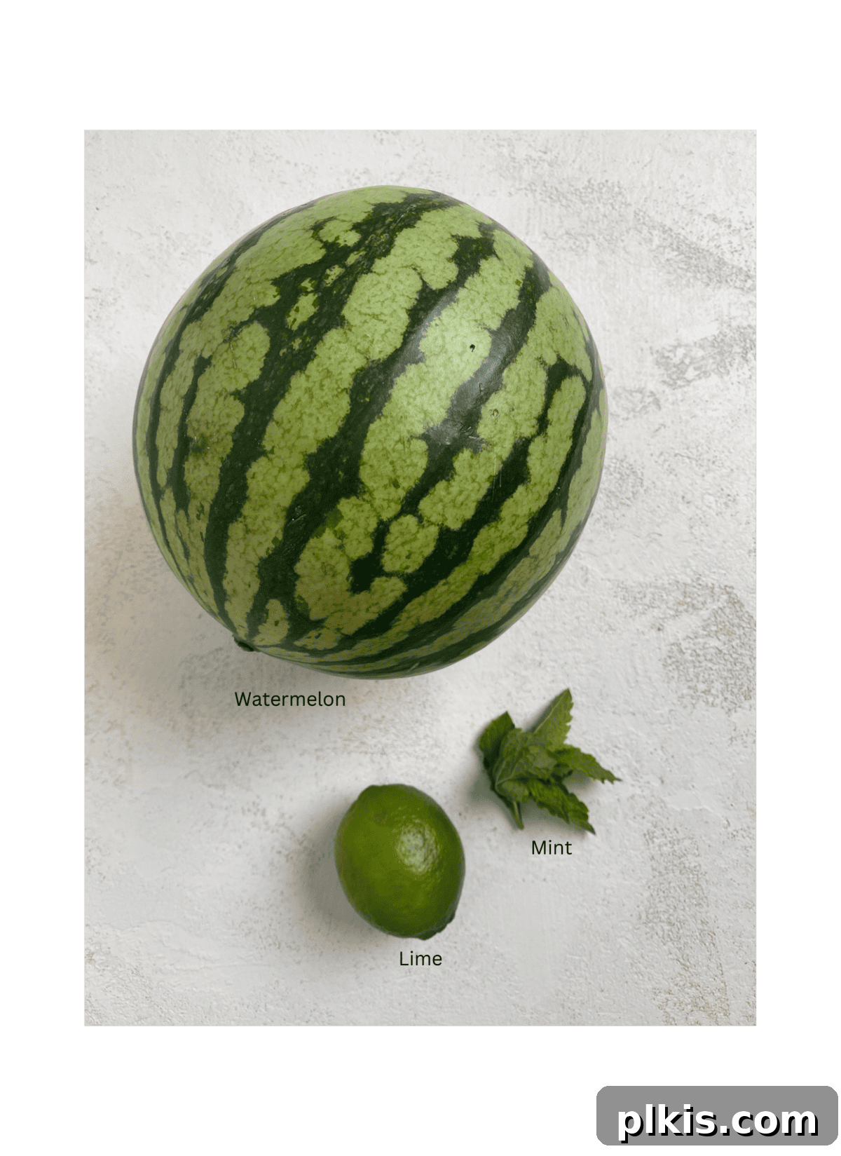 Sunshine Watermelon Pops 3 ingredients of watermelon, lime and mint on a white surface