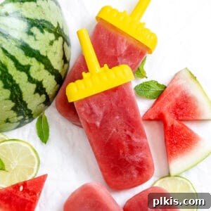 Sunshine Watermelon Pops 8 four completed Watermelon Popsicles with watermelon scattered in the background