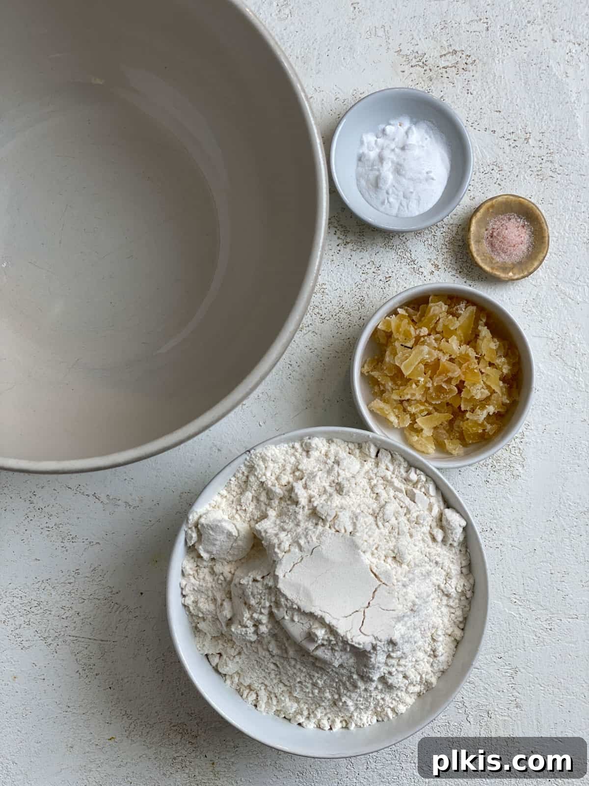 Bold Triple Ginger Vegan Snaps 4 Ingredients for Triple Ginger Vegan Gingersnaps laid out on a white surface, prior to mixing.