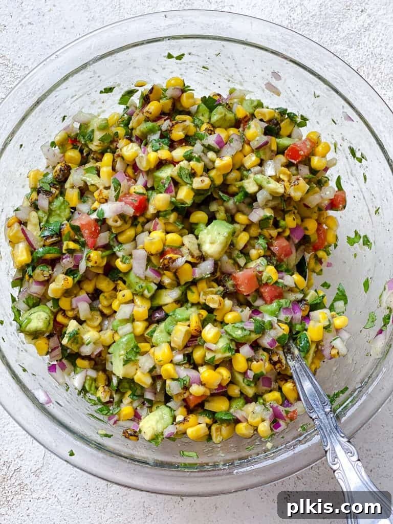 process shot of mixing ingredients together in a bowl