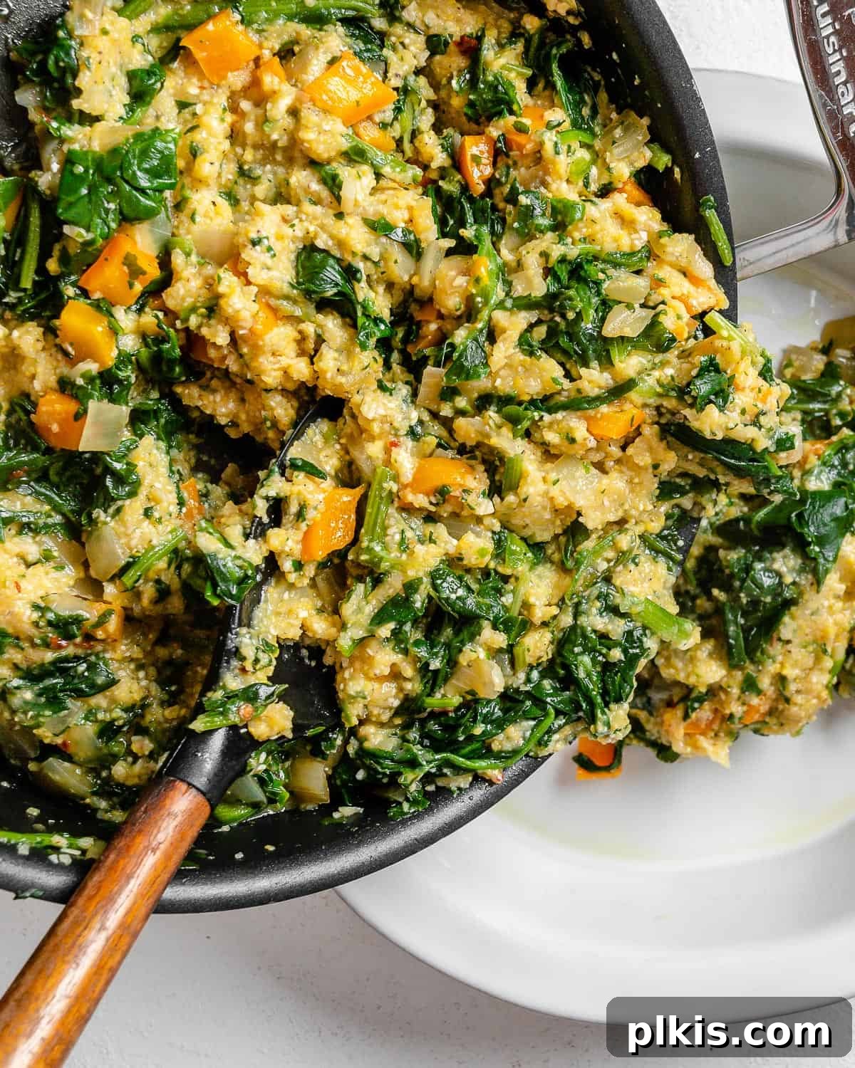 Golden Polenta Spinach Bake 18 The combined polenta and vegetable mixture smoothed into an oiled pie dish, ready to cool and be sliced into a savory pie.