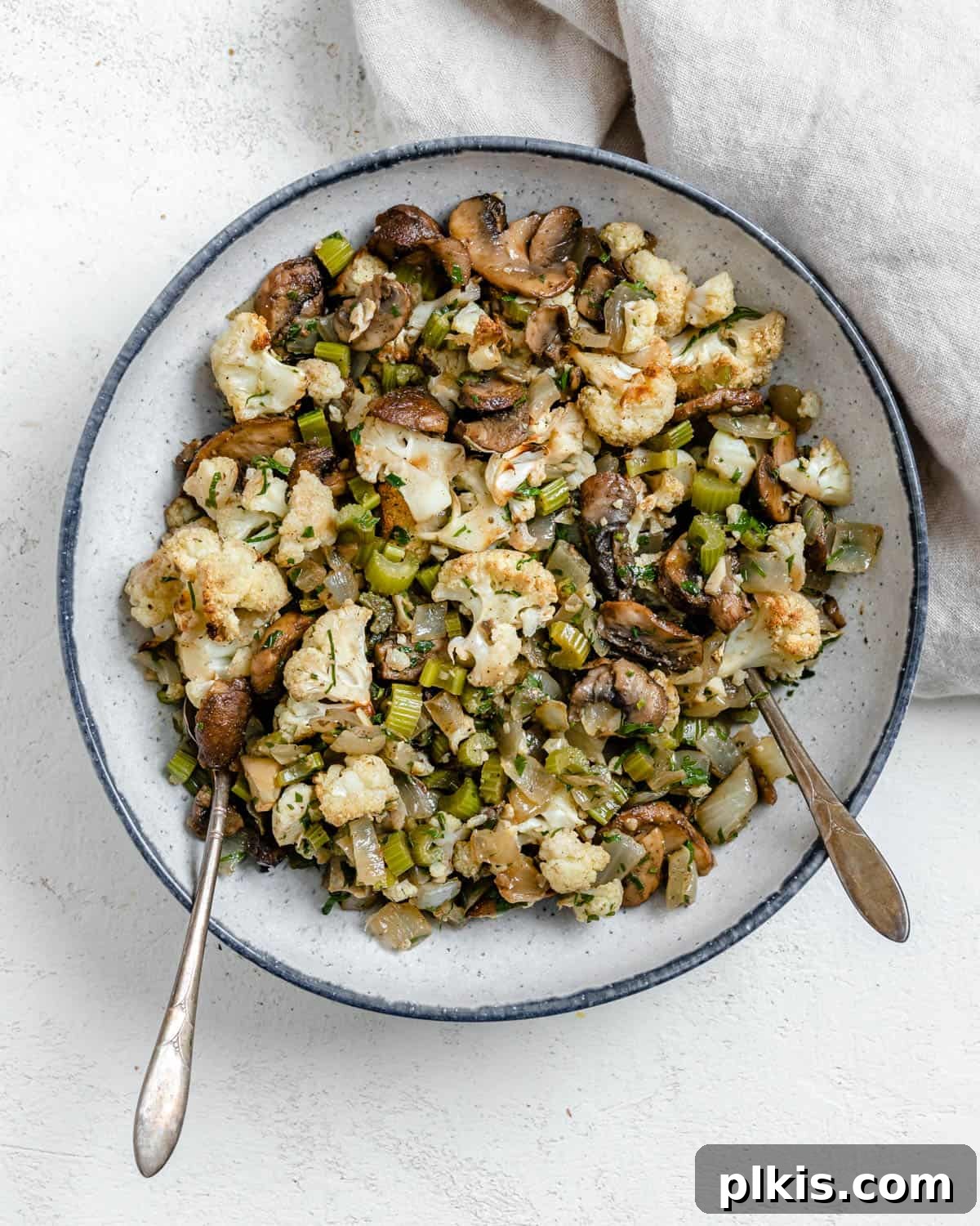 Irresistible Cauliflower Stuffing 2 completed The Best Cauliflower Stuffing plated against a white background