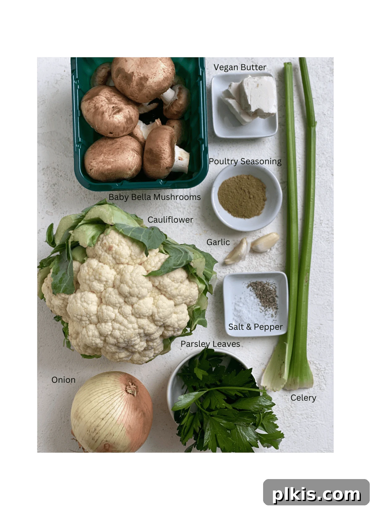 Irresistible Cauliflower Stuffing 3 ingredients for The Best Cauliflower Stuffing measured out against a white surface