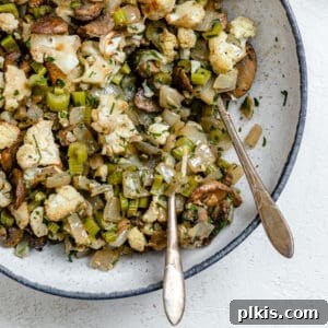 completed The Best Cauliflower Stuffing plated against a white background