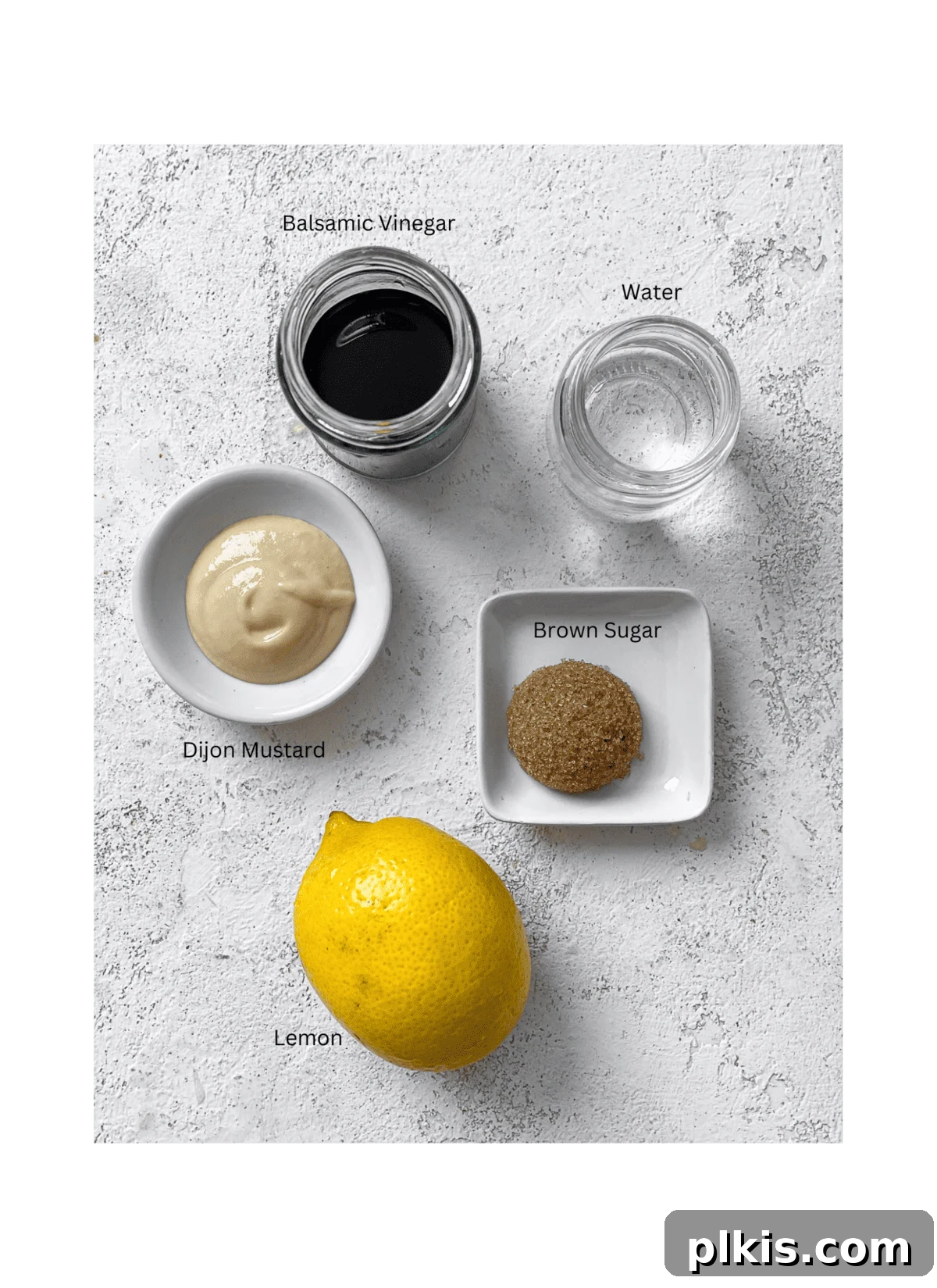 ingredients for 2-Minute Oil Free Salad Dressing [Balsamic Vinaigrette] measured out against a white surface
