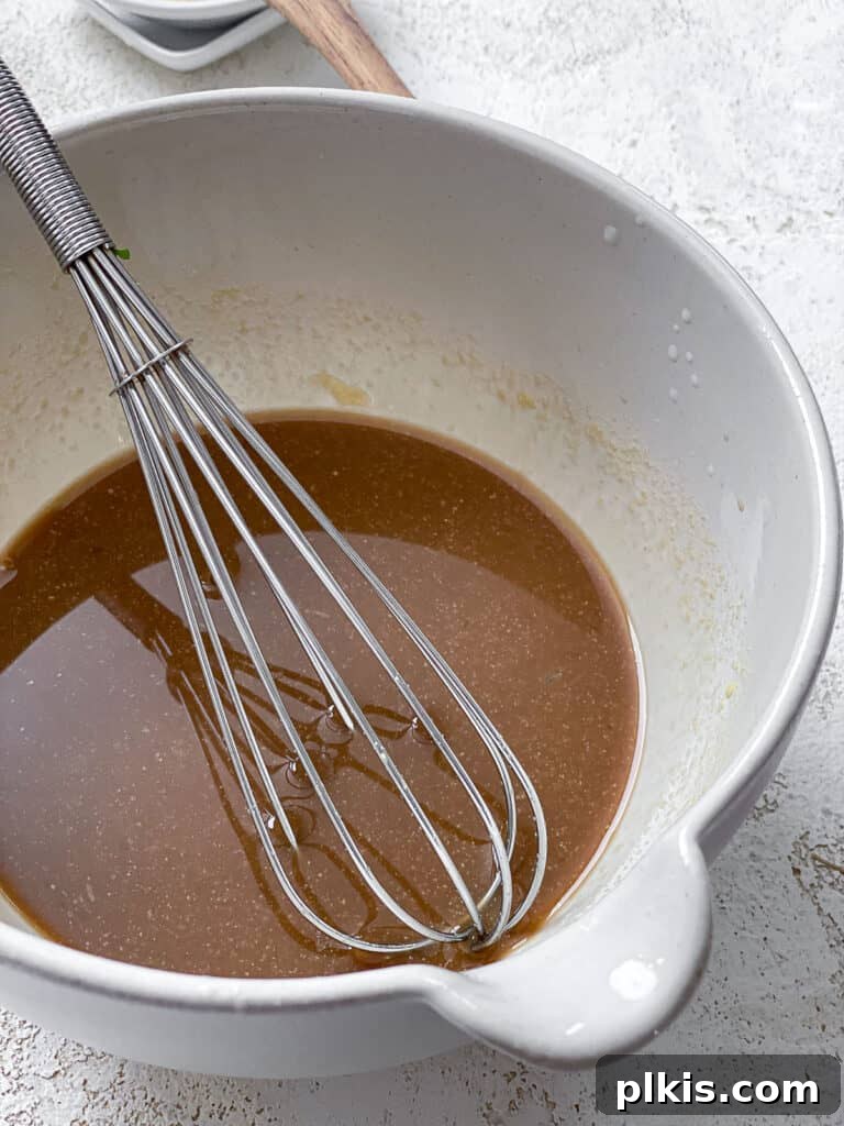 process shot of mixing ingredients in a bowl