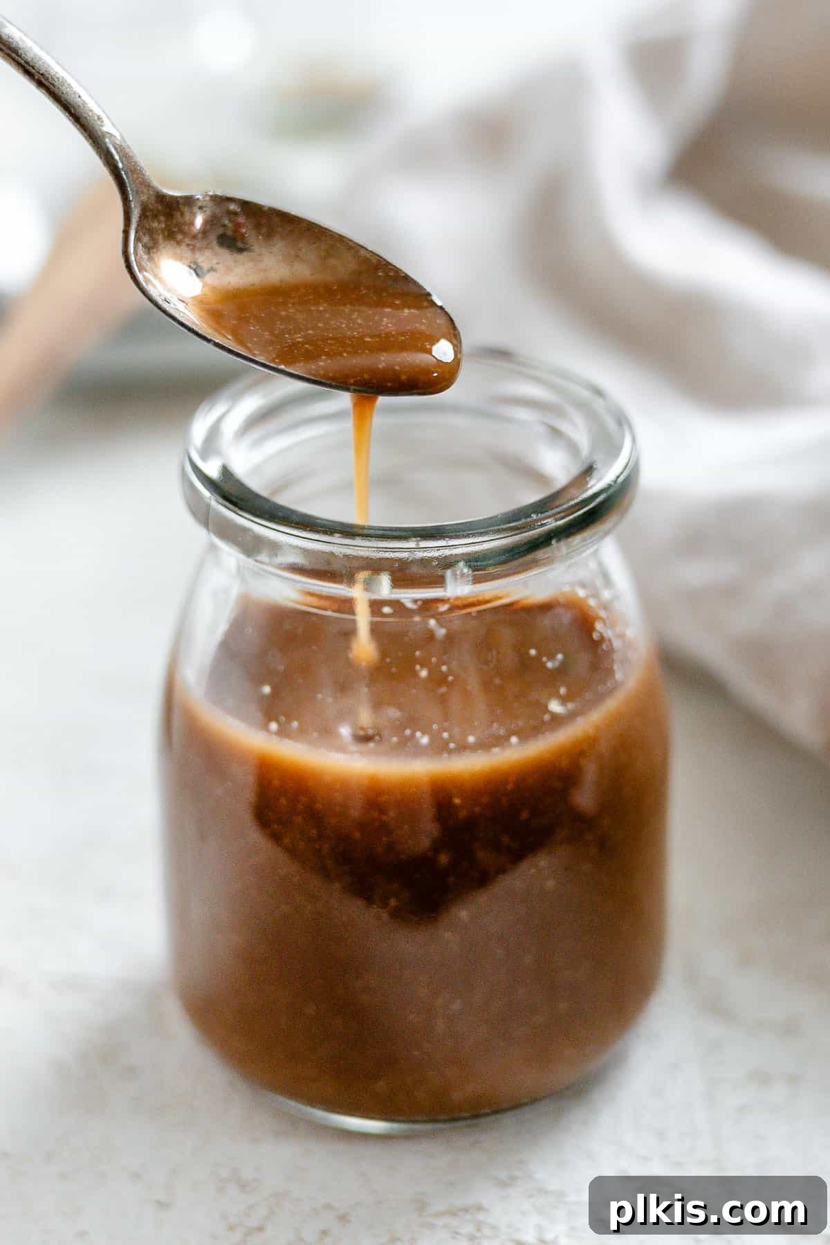 completed 2-Minute Oil Free Salad Dressing [Balsamic Vinaigrette] in a glass jar