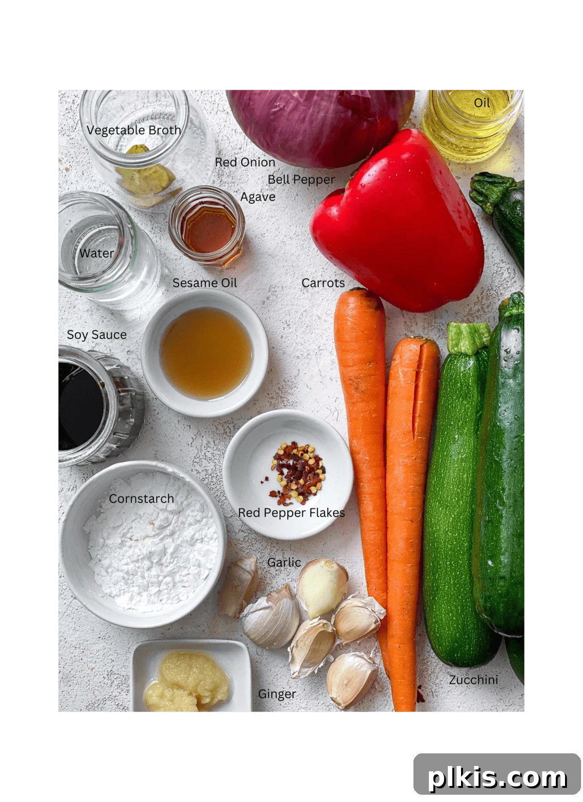 Speedy Zucchini Stir-Fry 3 Measured out ingredients for Easy Zucchini Stir Fry, including chopped vegetables and sauce components.