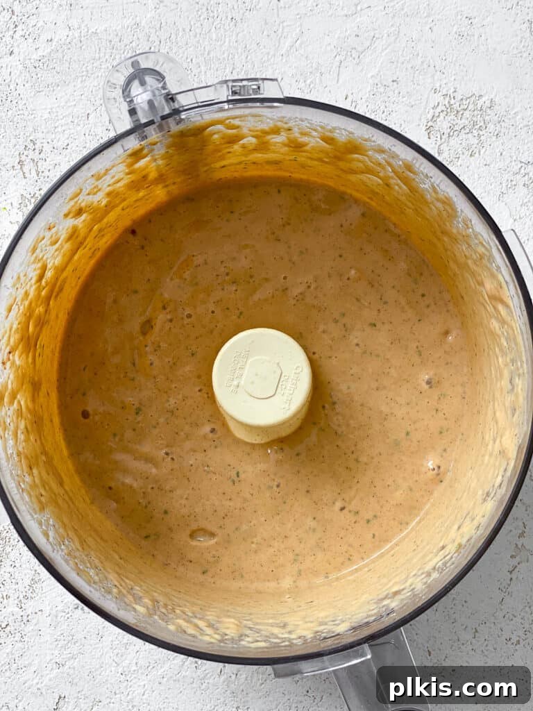 Spicy Vegan Chipotle Taco Dressing 5 Blended vegan chipotle sauce in a food processor