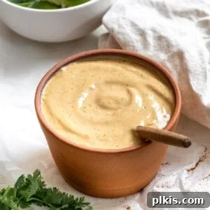 Spicy Vegan Chipotle Taco Dressing 8 Completed Vegan Chipotle Sauce in a white bowl, ready to serve
