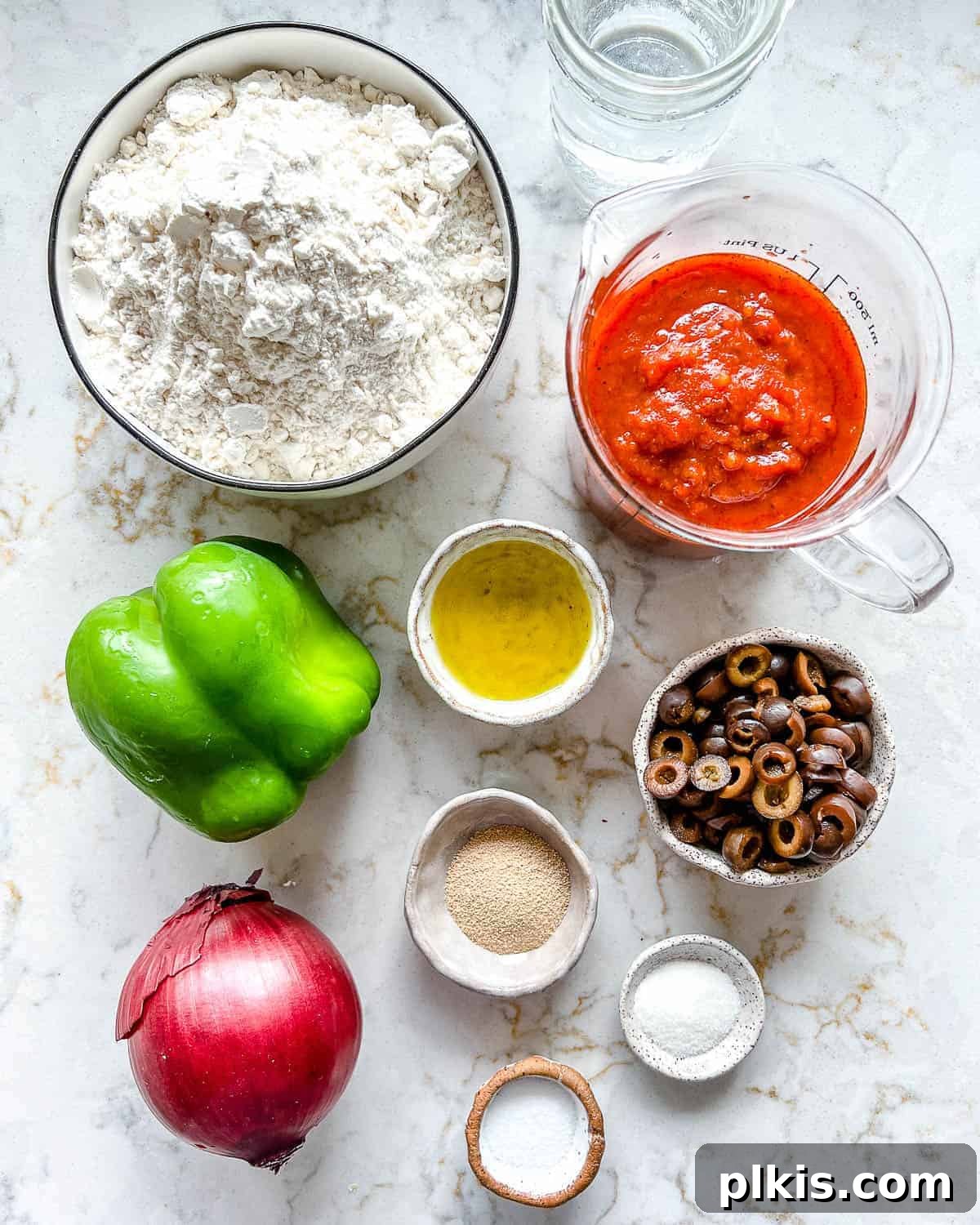 Perfect Vegan Calzones with Homemade Pizza Dough 3 measured out ingredients for Marinara Calzone against white surface