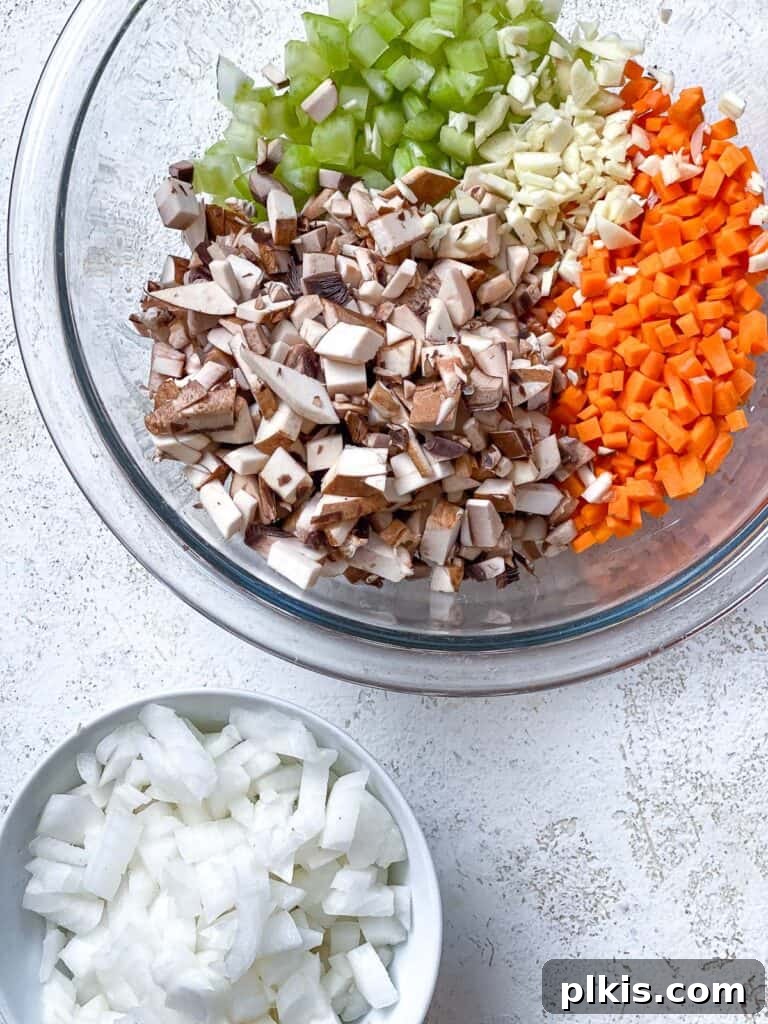 Wholesome Lentil Shepherd's Comfort 7 A bowl of finely chopped mushrooms, ready to add a 'meaty' texture and earthy flavor to the filling.