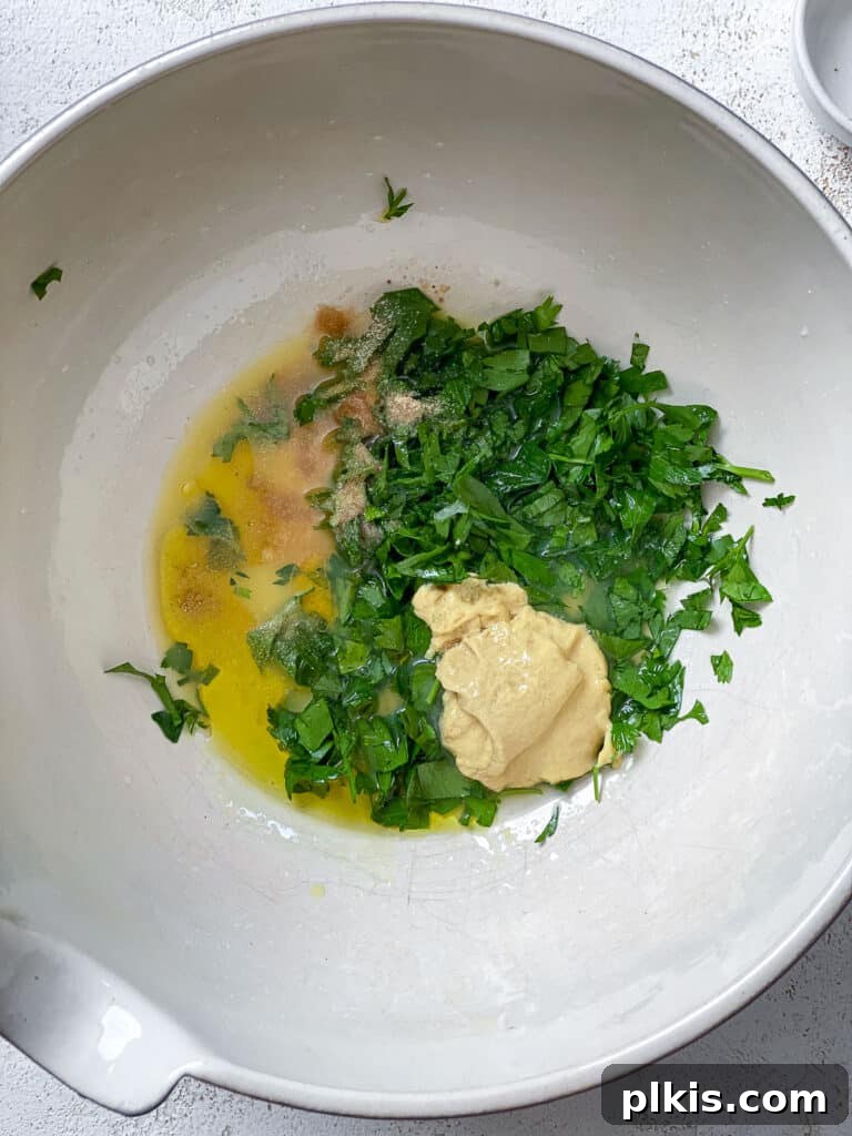 Sweet and Crunchy Carrot Raisin Medley 4 ingredients added to bowl