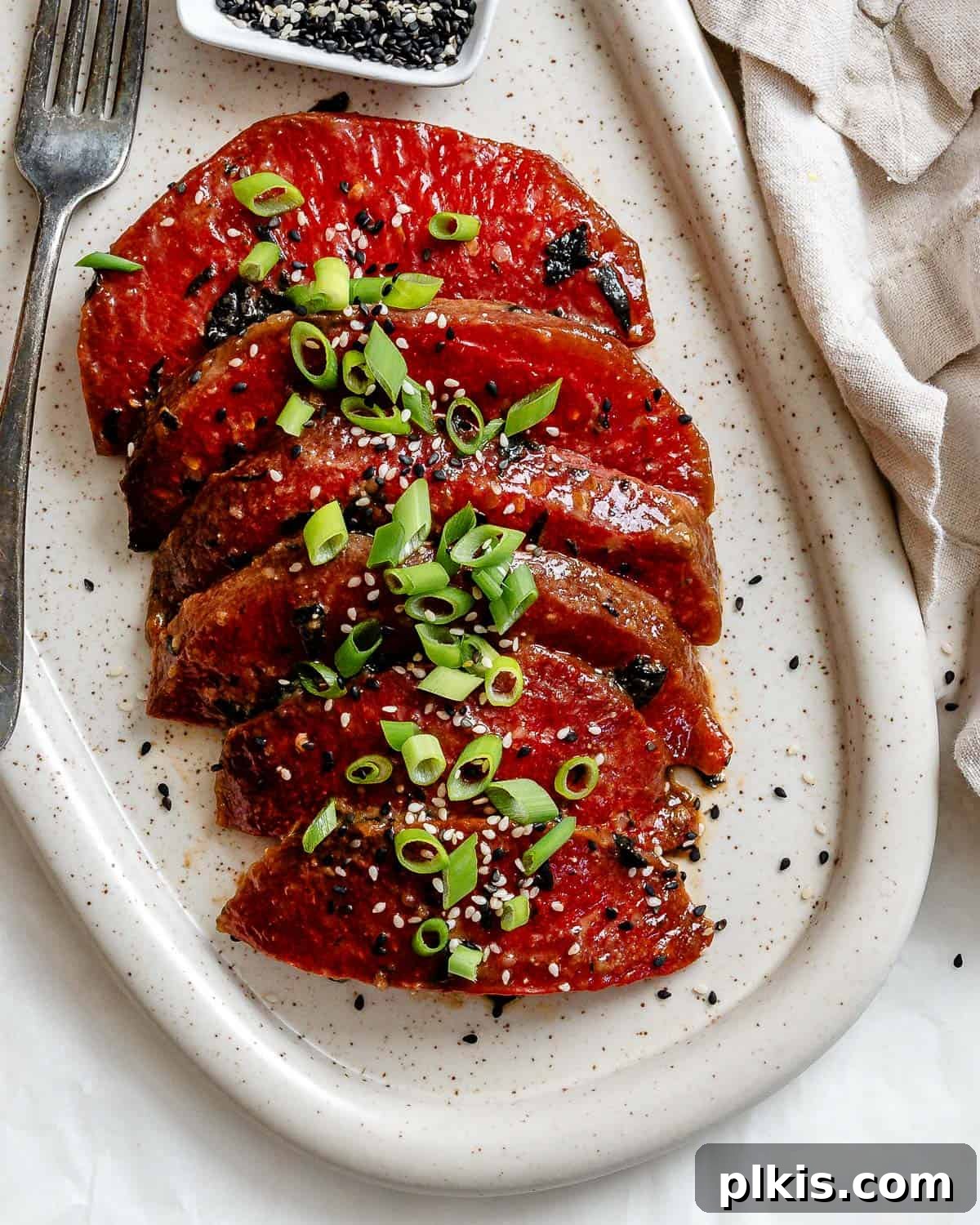 Watermelon Tuna: Sashimi and Steaks 2 Exquisitely plated Watermelon Tuna sashimi and steaks on a baking dish, ready to be enjoyed as a plant-based delicacy.