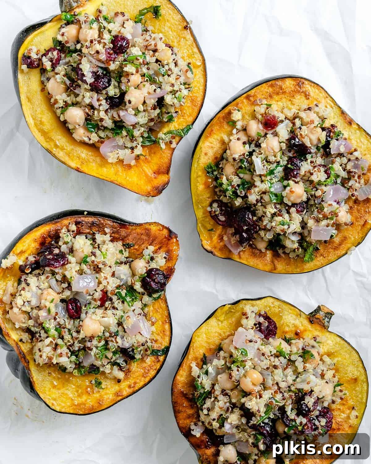 completed Vegan Stuffed Acorn Squash [With Quinoa] on a baking dish