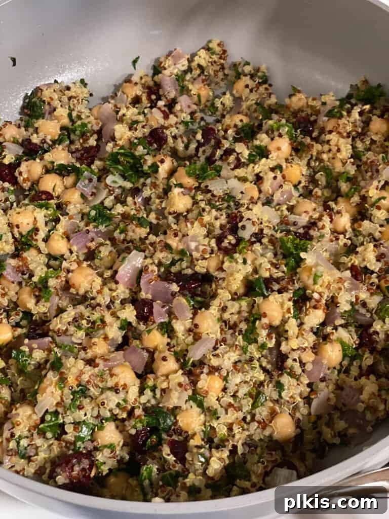 Hearty Vegan Quinoa Stuffed Acorn Squash 12 process shot of filling mixture on pan
