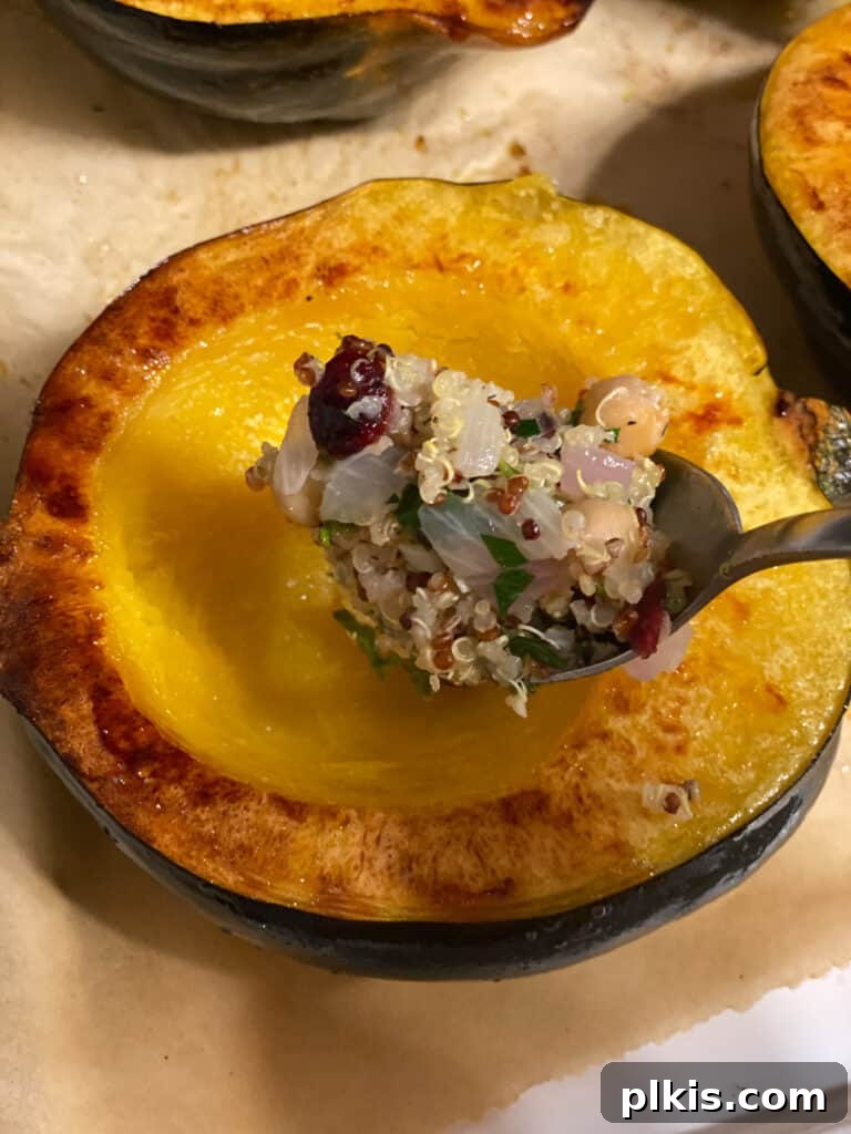 Hearty Vegan Quinoa Stuffed Acorn Squash 14 process shot of adding filling to squash