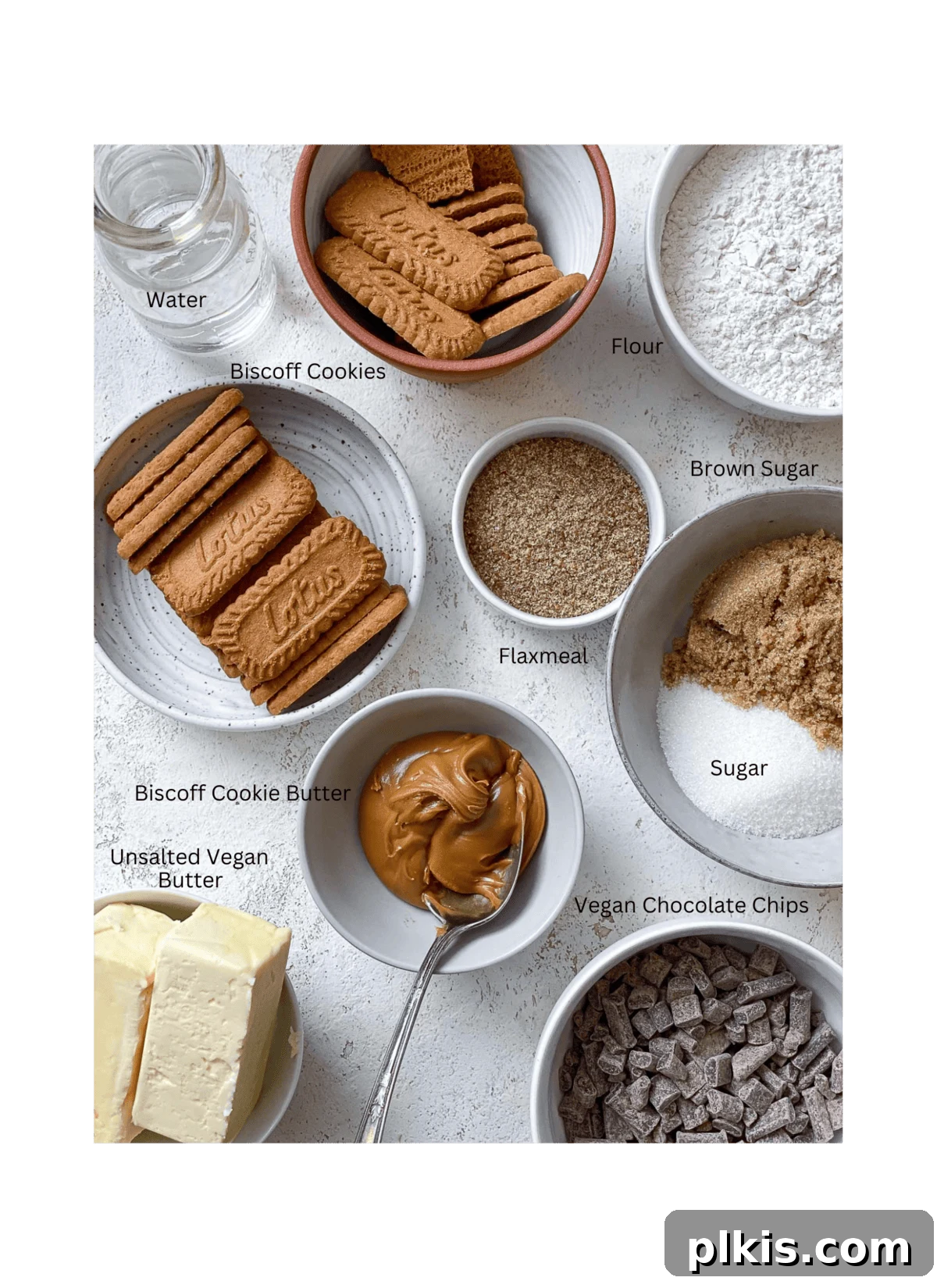 Swirled Biscoff Fudgy Brownies 3 Carefully measured ingredients for Biscoff Brownies displayed on a pristine white surface, ready for baking.