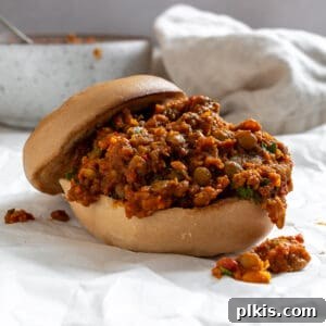 Delicious Lentil Sloppy Joes served in a hamburger bun, ready to eat.
