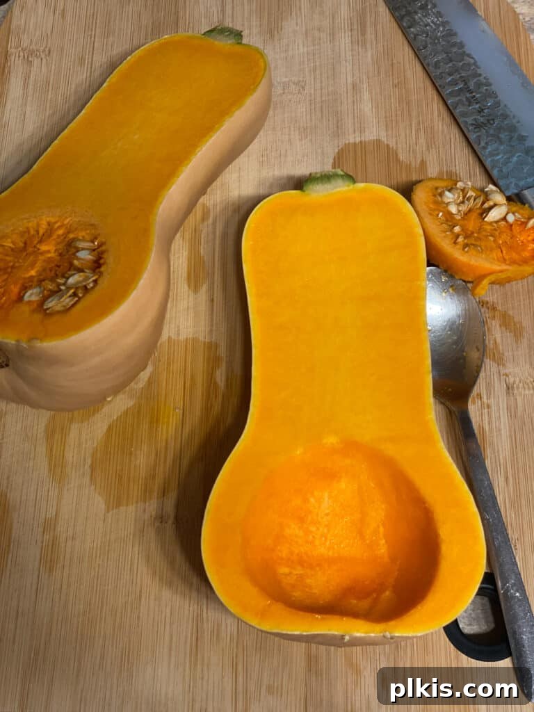 Golden Thai Squash Elixir 4 Butternut squash halved lengthwise, seeds and fibrous strands removed, ready for roasting.